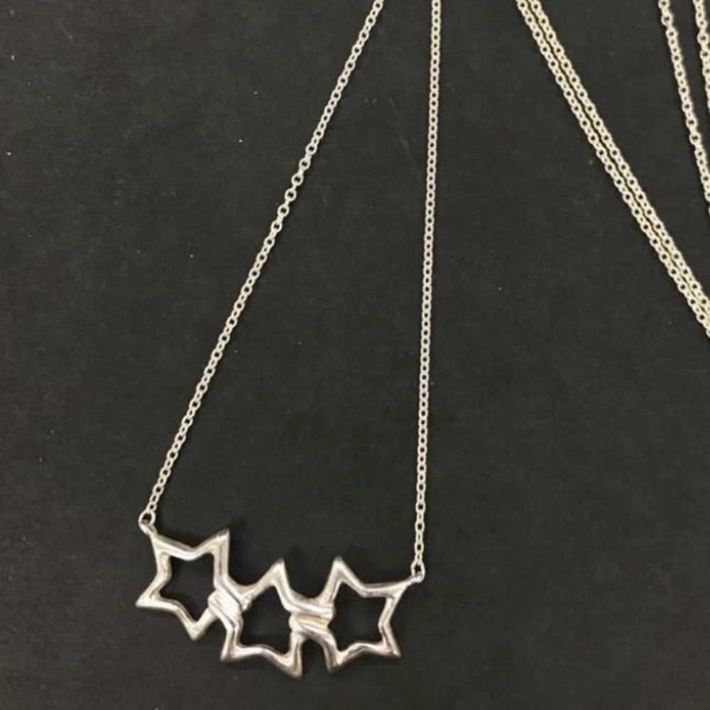 Tiffany & CO. 3 star sterling silver necklace. No flaws. Excellent condition.